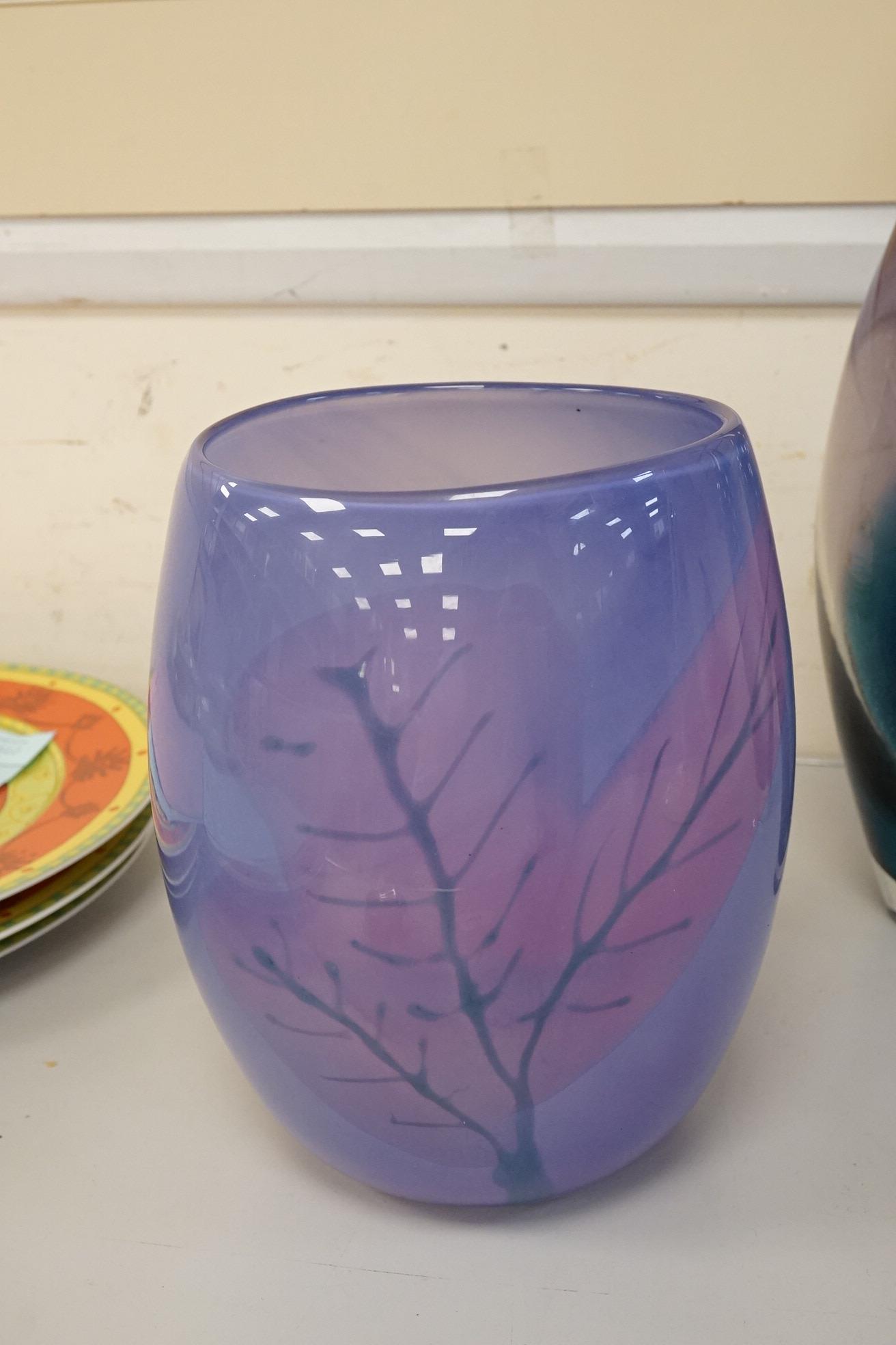 Three art glass vases to include a pair of purple and blue stem vases, 42cm high